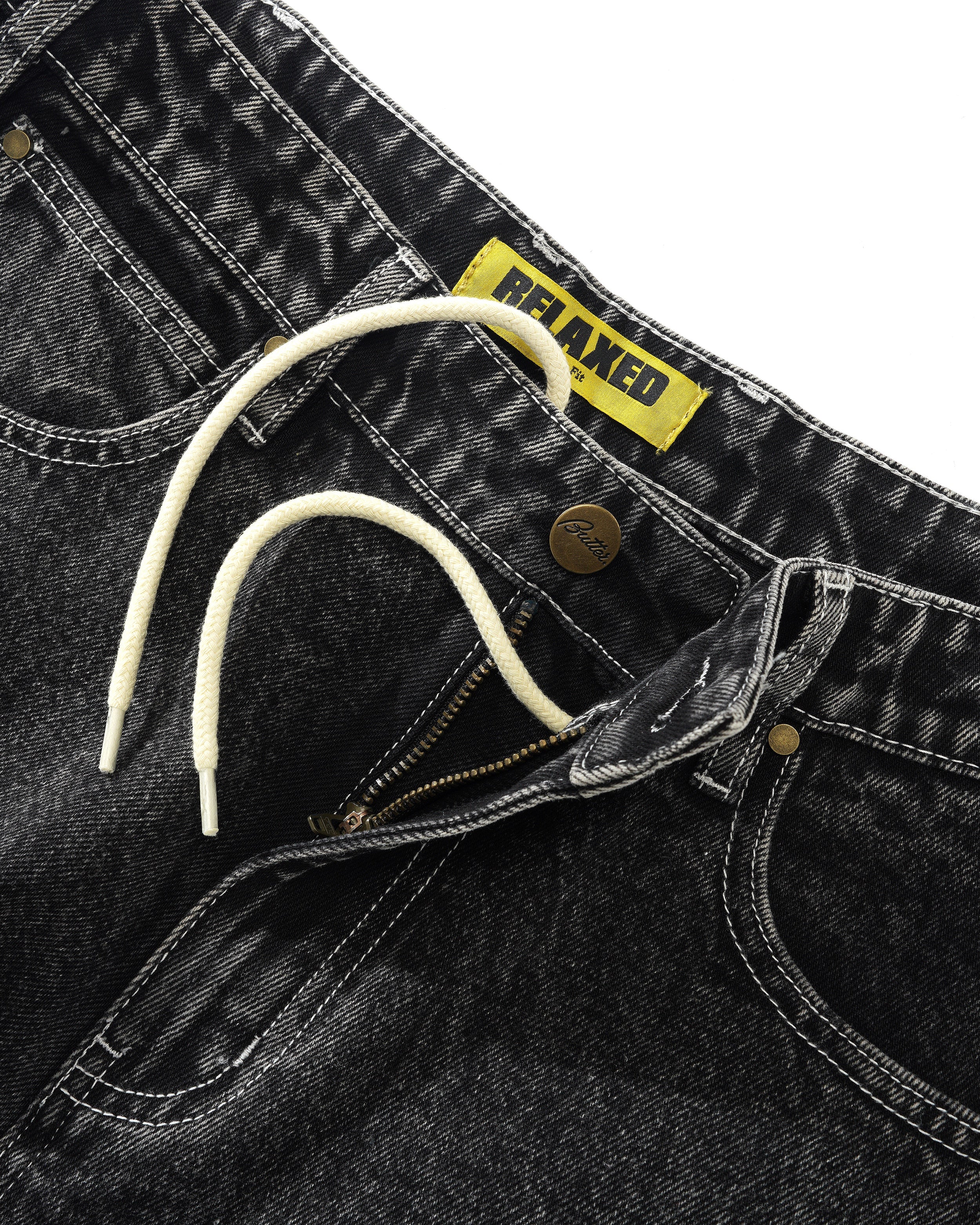 BUTTER - Vaqueros Art Denim, lavados en negro 