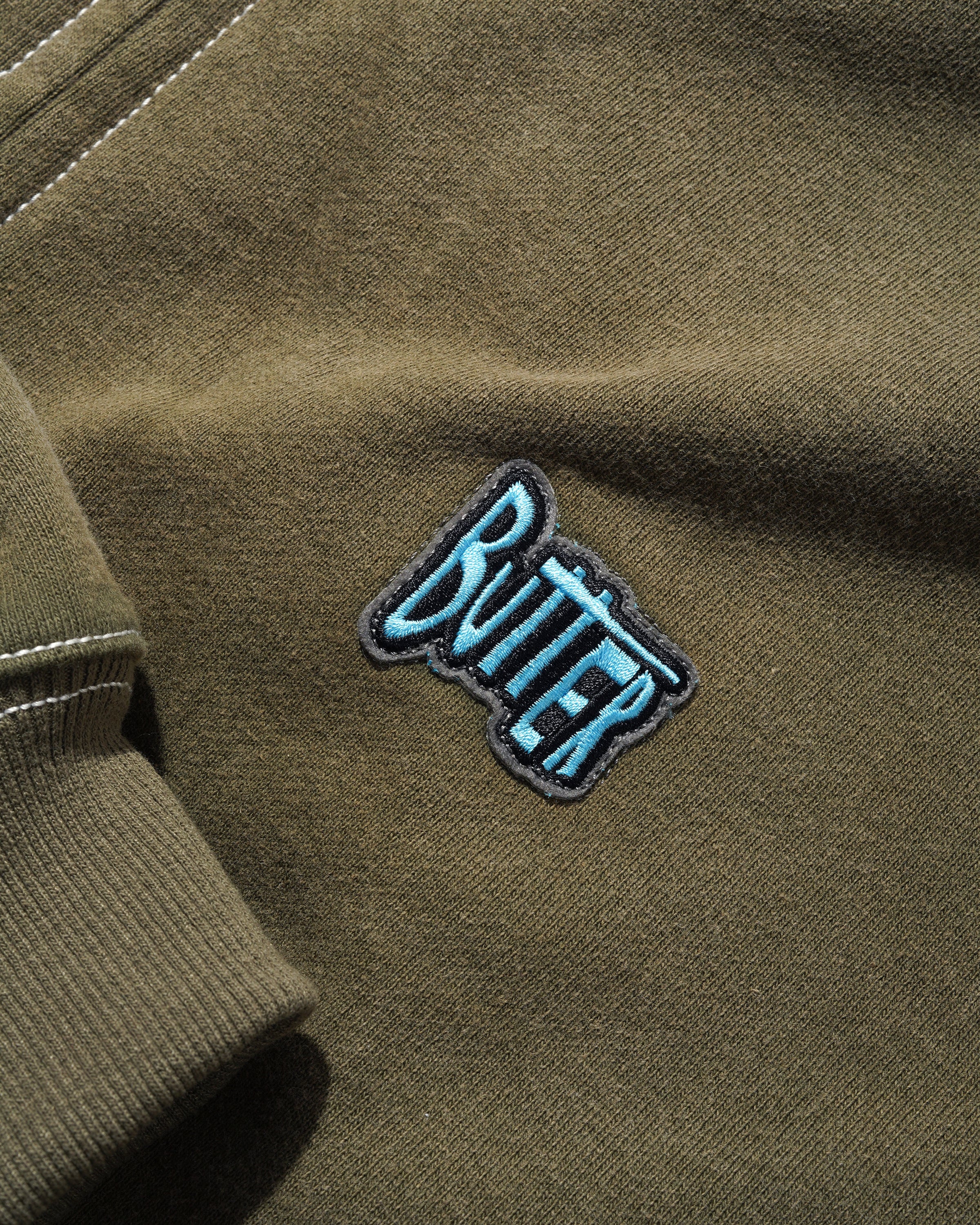 BUTTER - SKETCH ZIP-THRU - ARMY